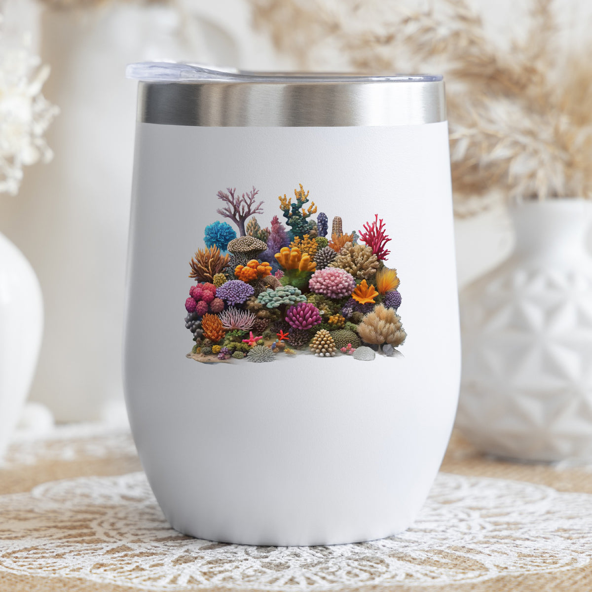 Colorful Coral Reef UV DTF sticker applied to a white stemless tumbler with a lid