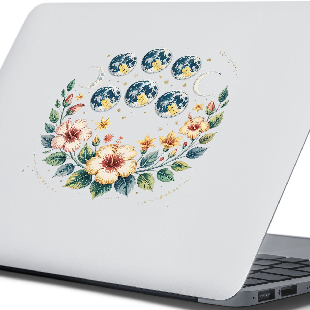 Moon Phases With Hibiscus Flowers UV DTF sticker applied to the lid of a silver laptop
