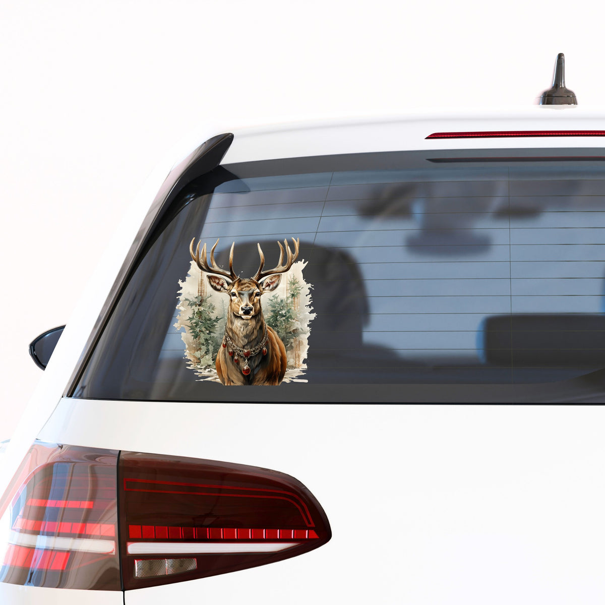 Stag With Jeweled Necklace UV DTF sticker applied to the rear window of a white car