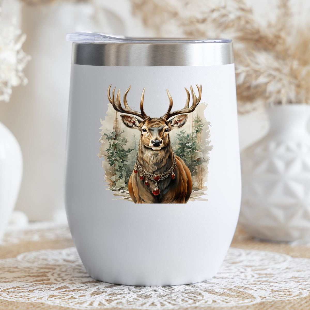 Stag With Jeweled Necklace UV DTF sticker applied to a white stemless tumbler with a lid