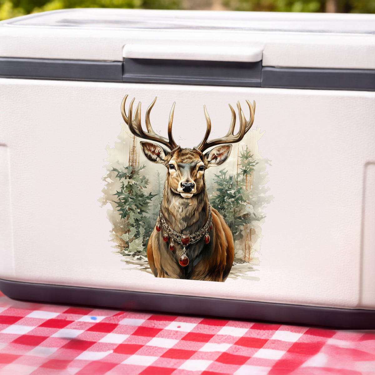 Stag With Jeweled Necklace UV DTF sticker applied to a white cooler on a red gingham cloth