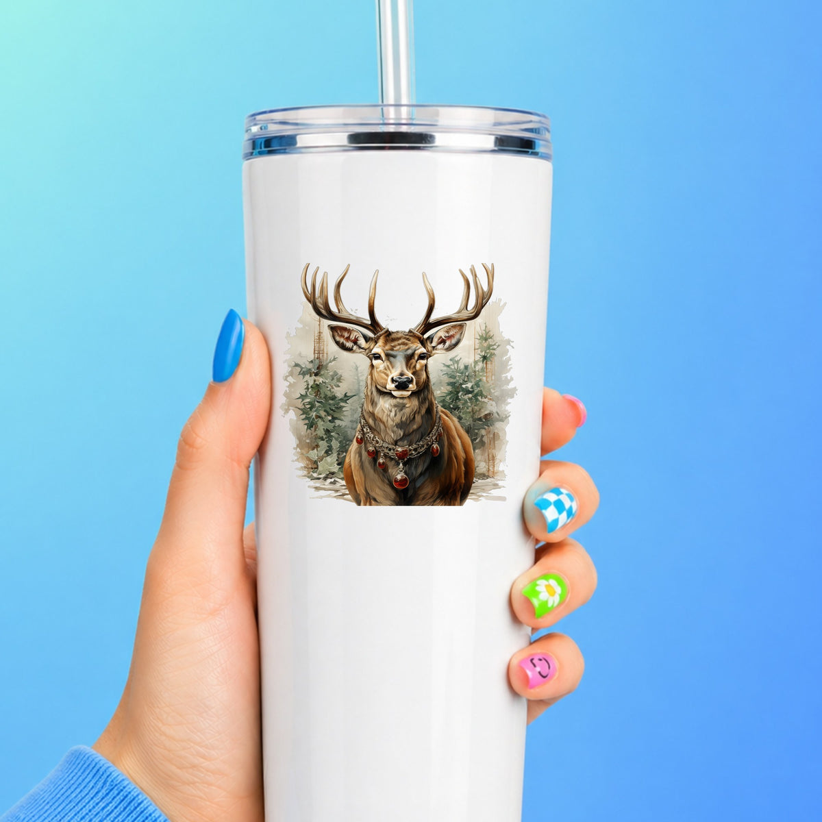 Stag With Jeweled Necklace UV DTF sticker applied to a white straw tumbler on a blue background