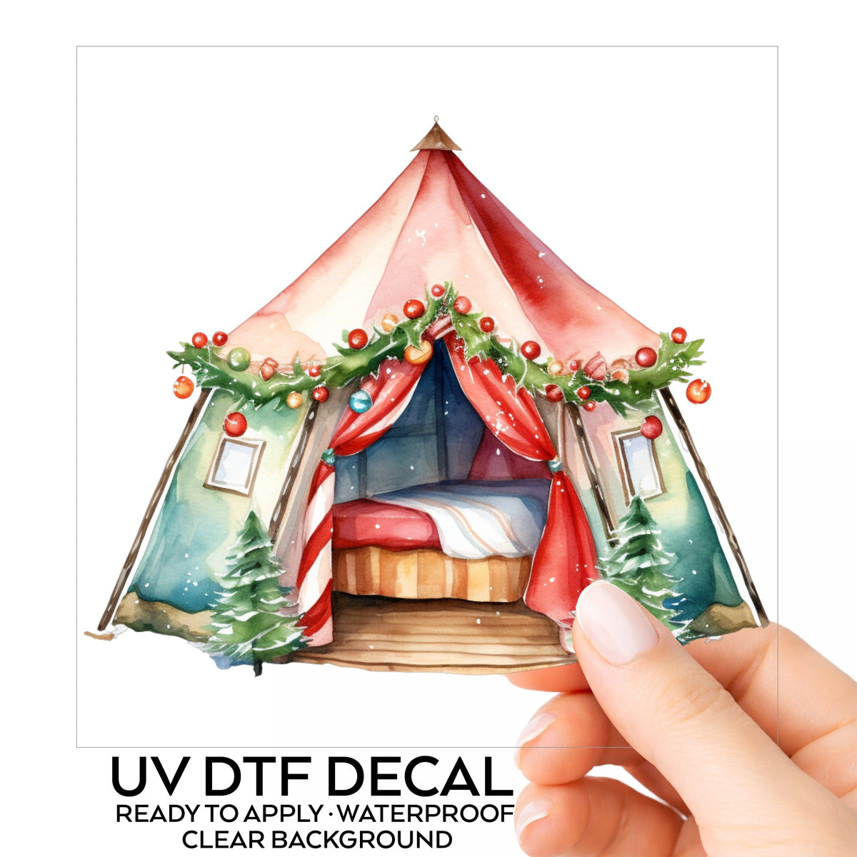 Christmas Glamping Tent UV DTF sticker on its backing card, held in hand