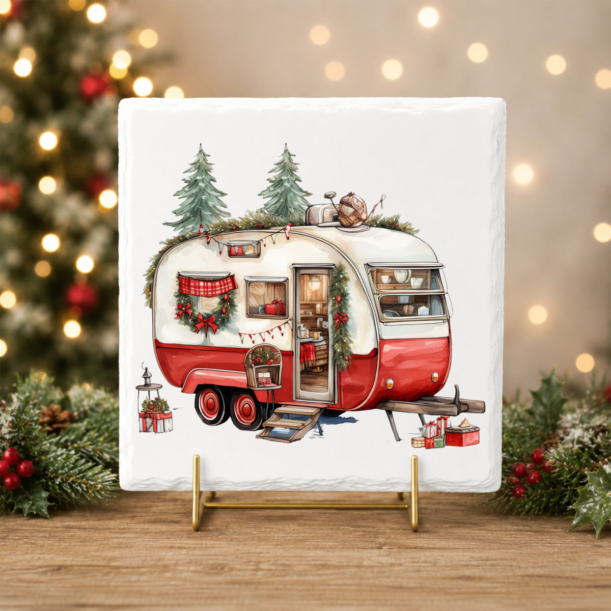 Vintage Christmas Camper Trailer UV DTF sticker applied to a white tile on a gold stand