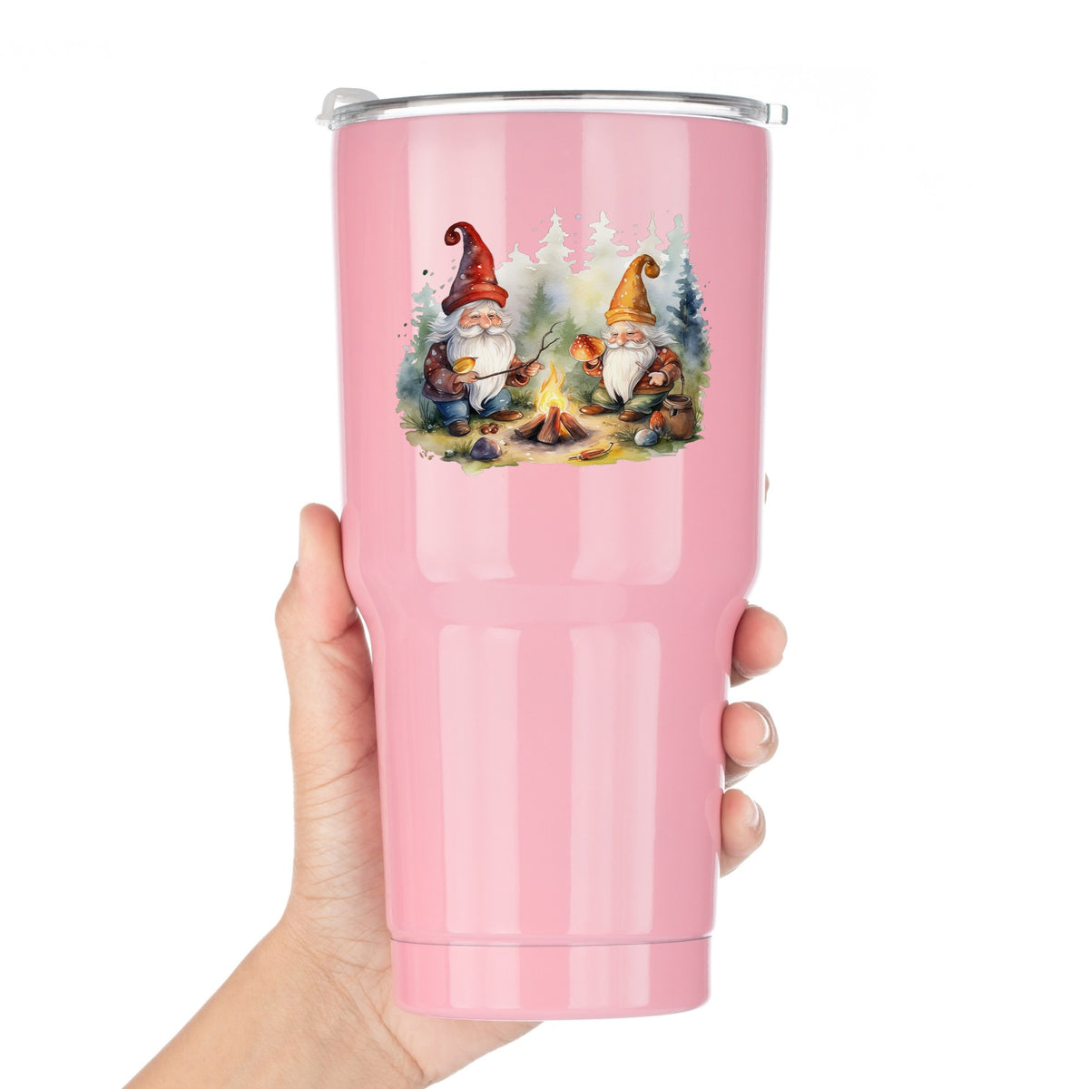 Gnomes At A Campfire UV DTF sticker applied to a pink tumbler held against a white background