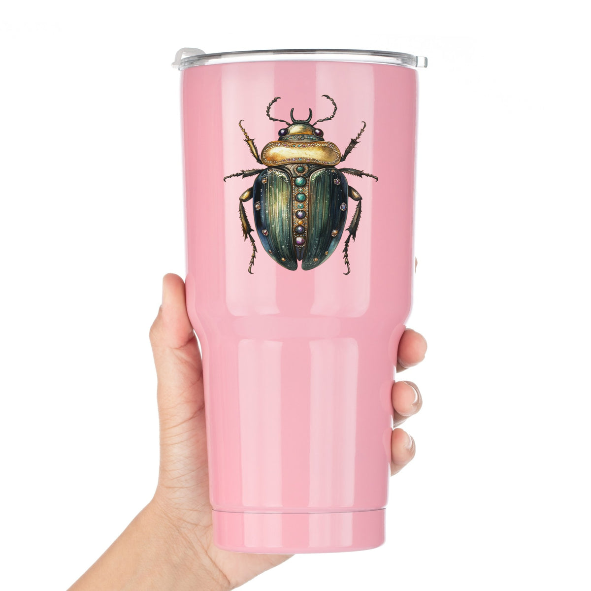 Jeweled Gold Scarab Beetle UV DTF sticker applied to a pink tumbler held against a white background