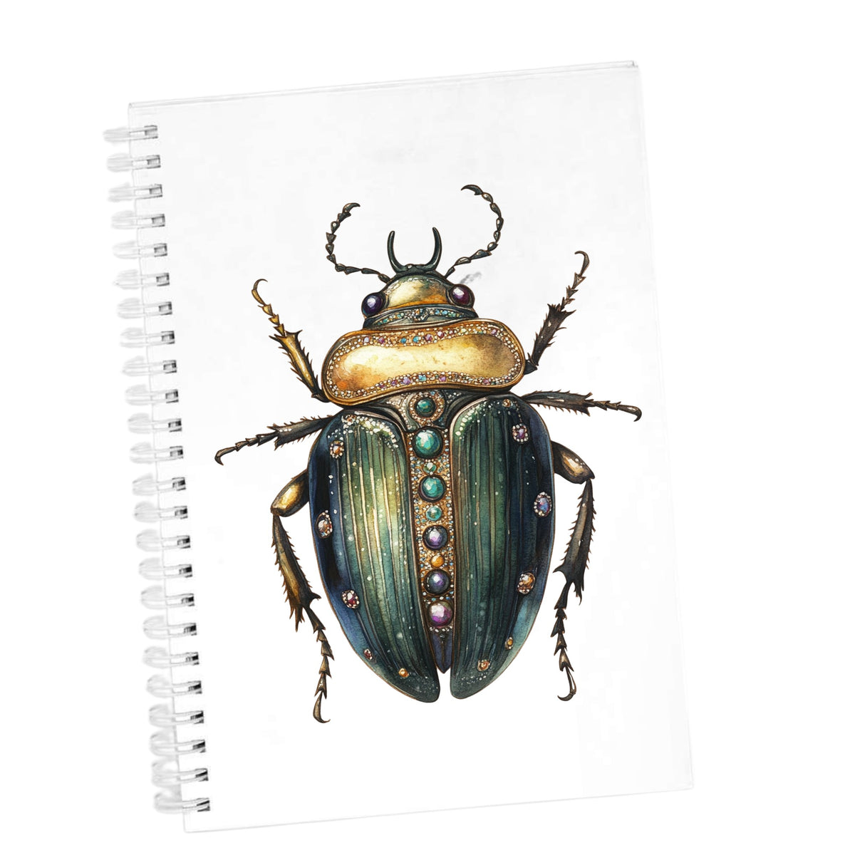 Jeweled Gold Scarab Beetle UV DTF sticker applied to the cover of a white spiral journal