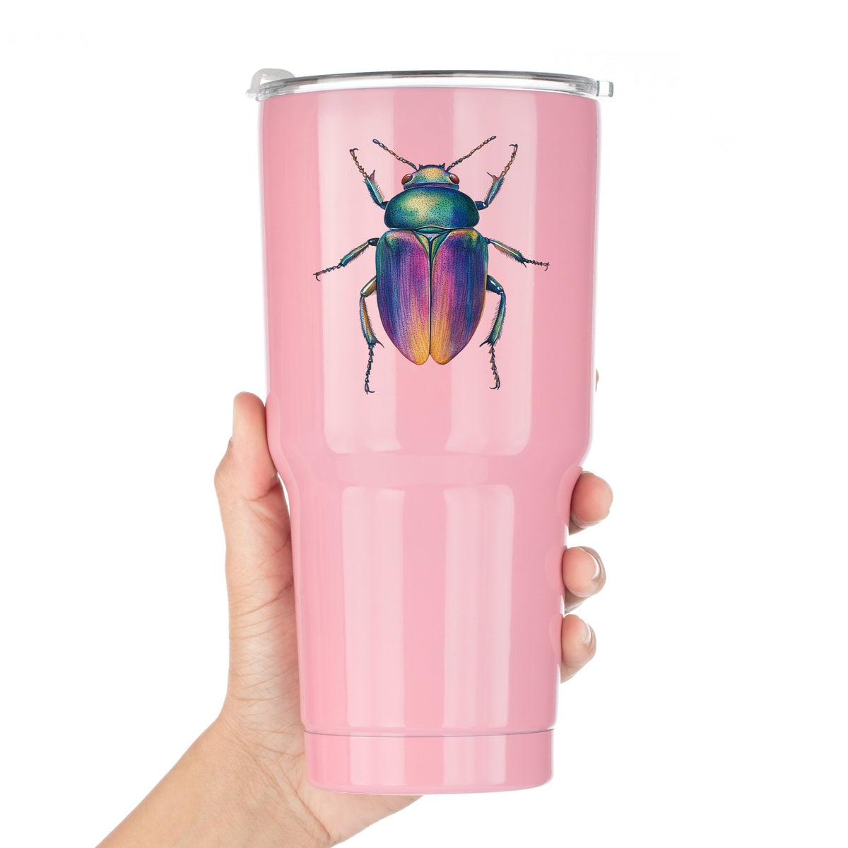 Rainbow Iridescent Beetle UV DTF sticker applied to a pink tumbler held against a white background