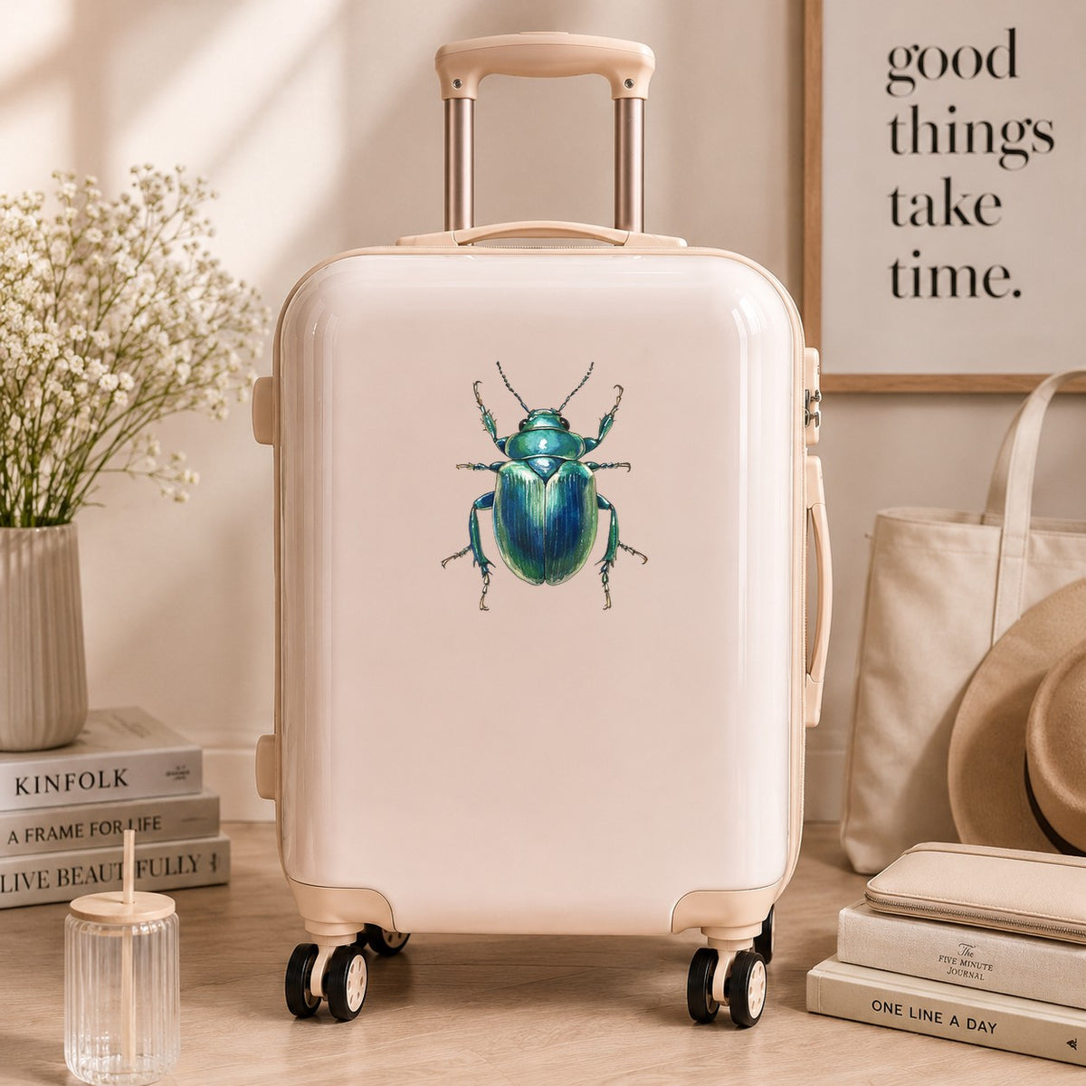 Striped Teal Beetle UV DTF sticker applied to a cream carry-on suitcase