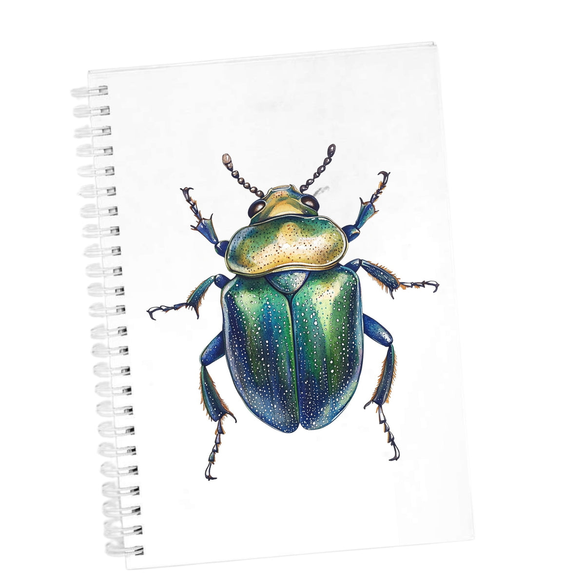 Speckled Green Beetle UV DTF sticker applied to the cover of a white spiral journal