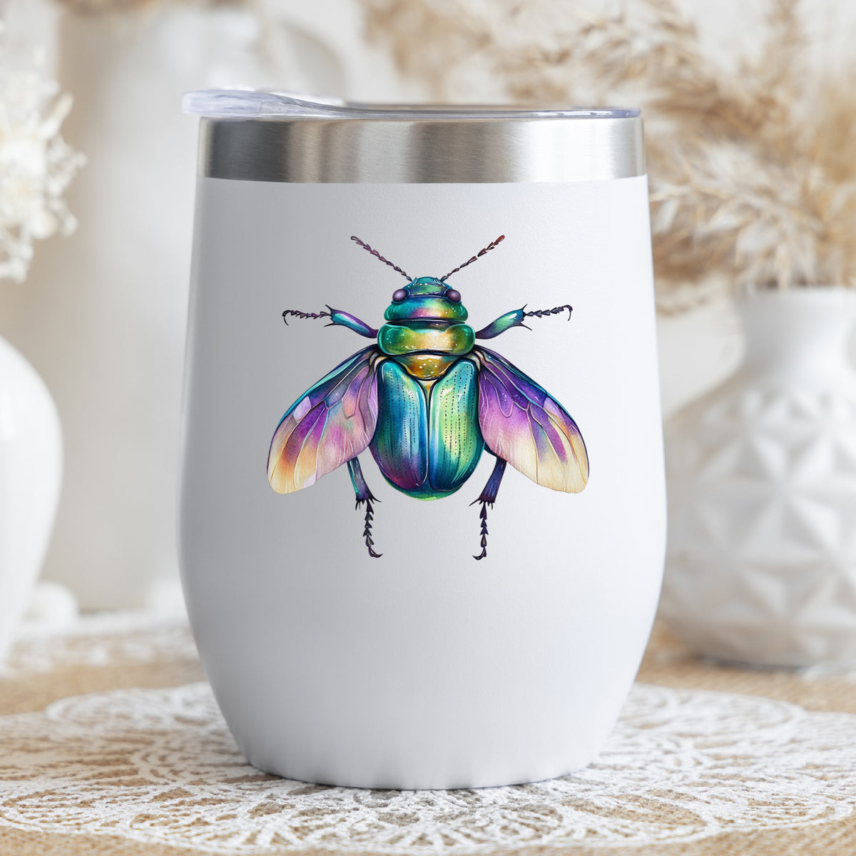 Flying Beetle With Open Wings UV DTF sticker applied to a white stemless tumbler with a lid