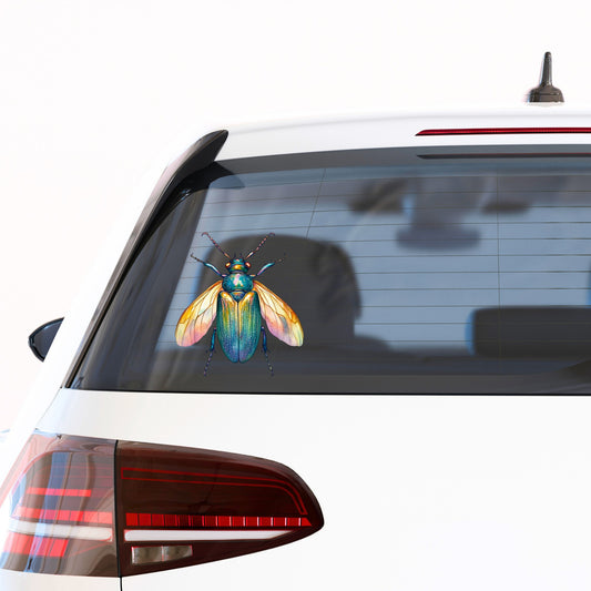 Golden Winged Flying Beetle UV DTF sticker applied to the rear window of a white car