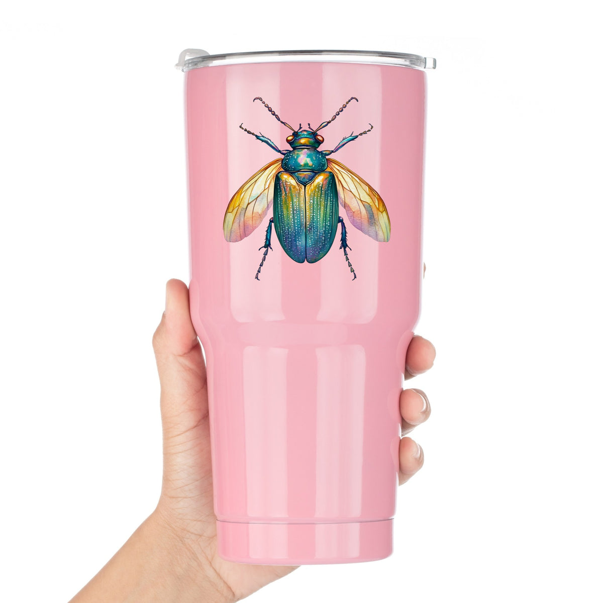 Golden Winged Flying Beetle UV DTF sticker applied to a pink tumbler held against a white background