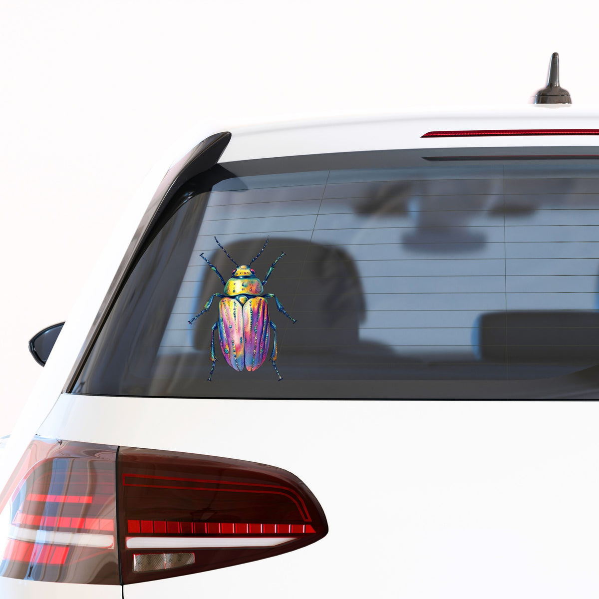 Purple Dewdrop Beetle UV DTF sticker applied to the rear window of a white car