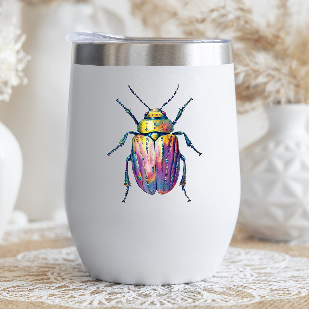 Purple Dewdrop Beetle UV DTF sticker applied to a white stemless tumbler with a lid