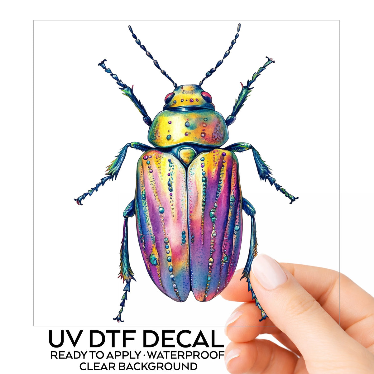 Purple Dewdrop Beetle UV DTF sticker on its backing card, held in hand
