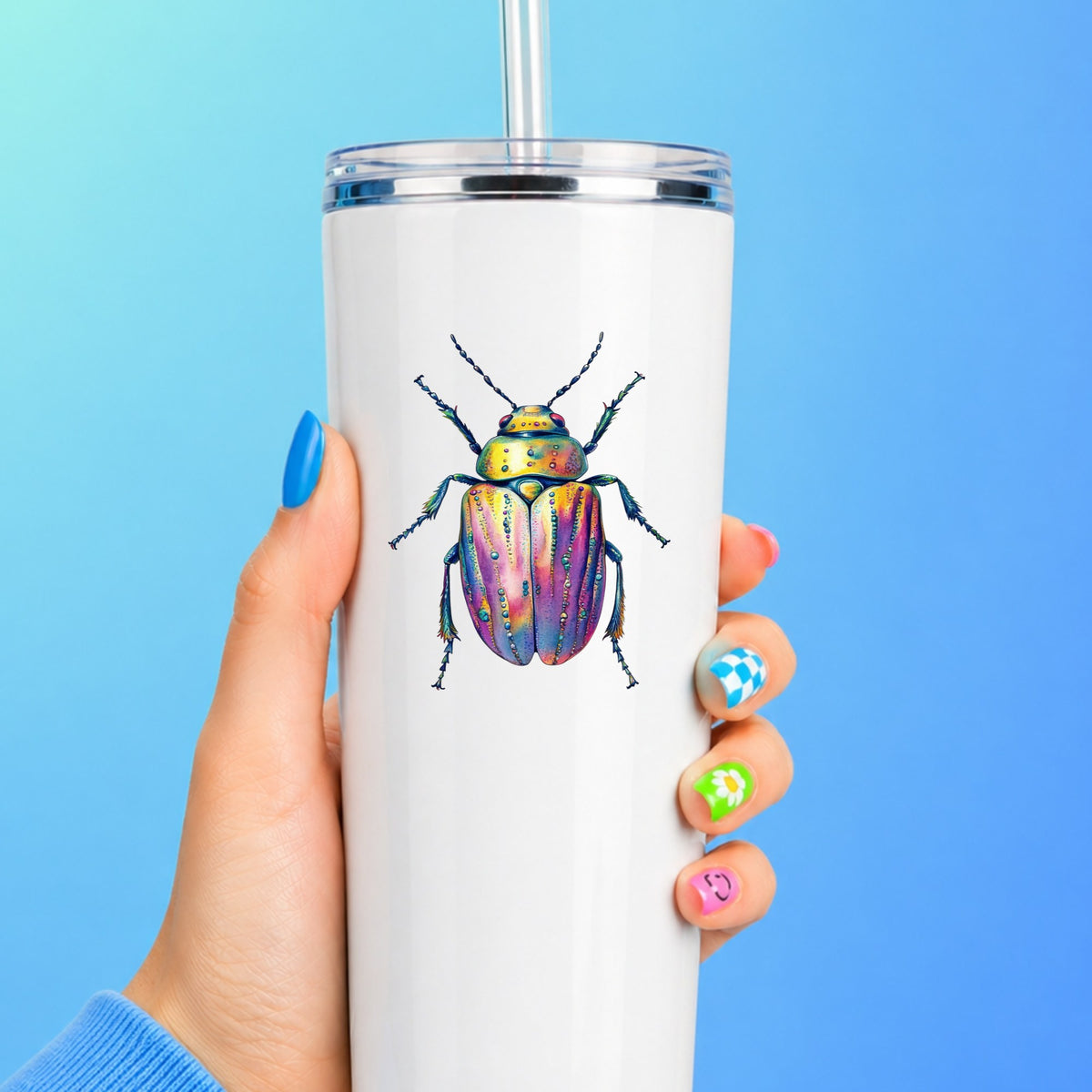 Purple Dewdrop Beetle UV DTF sticker applied to a white straw tumbler on a blue background