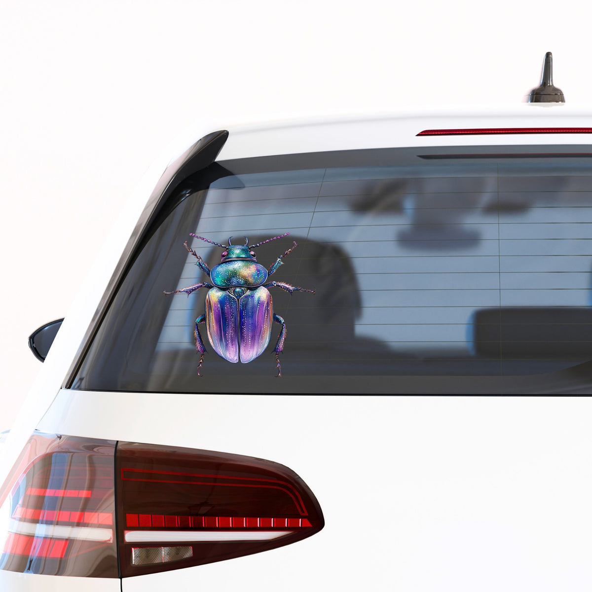Violet Sparkle Beetle UV DTF sticker applied to the rear window of a white car