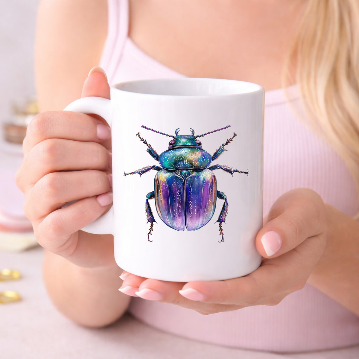 Violet Sparkle Beetle UV DTF sticker applied to a white coffee mug held in both hands
