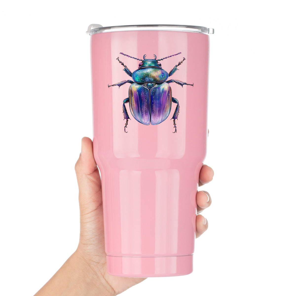 Violet Sparkle Beetle UV DTF sticker applied to a pink tumbler held against a white background