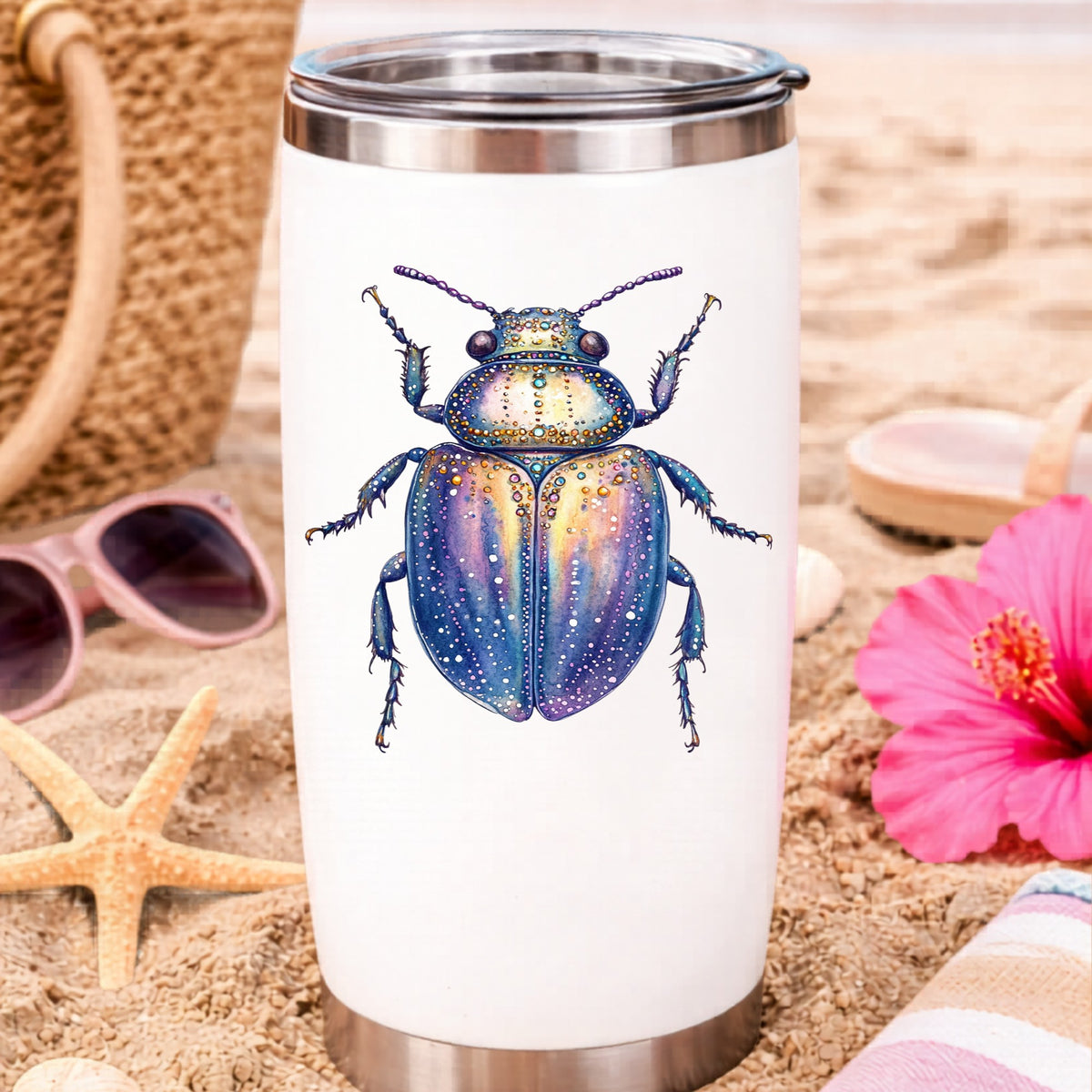 Lavender Jeweled Beetle UV DTF sticker applied to a white travel tumbler on beach sand