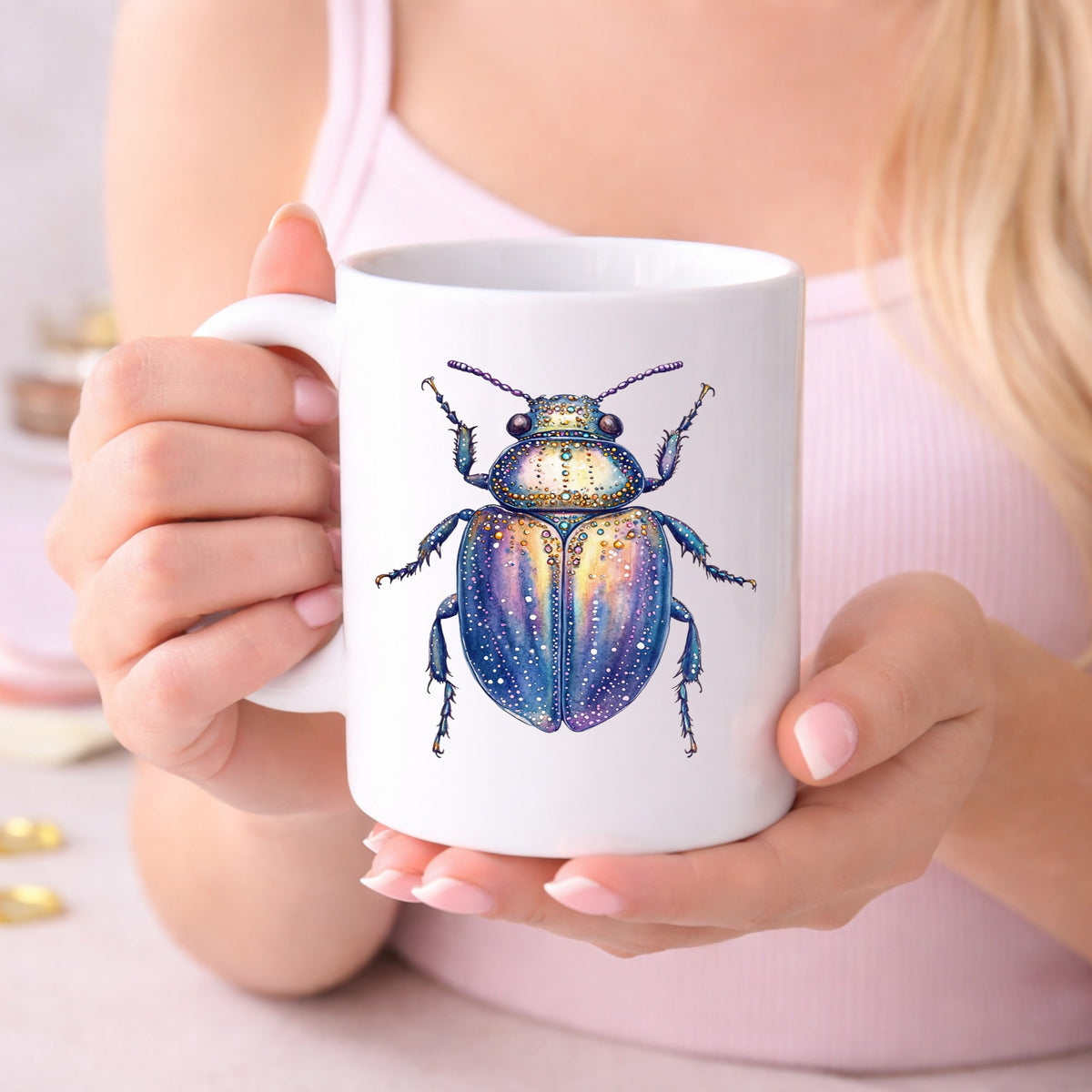 Lavender Jeweled Beetle UV DTF sticker applied to a white coffee mug held in both hands