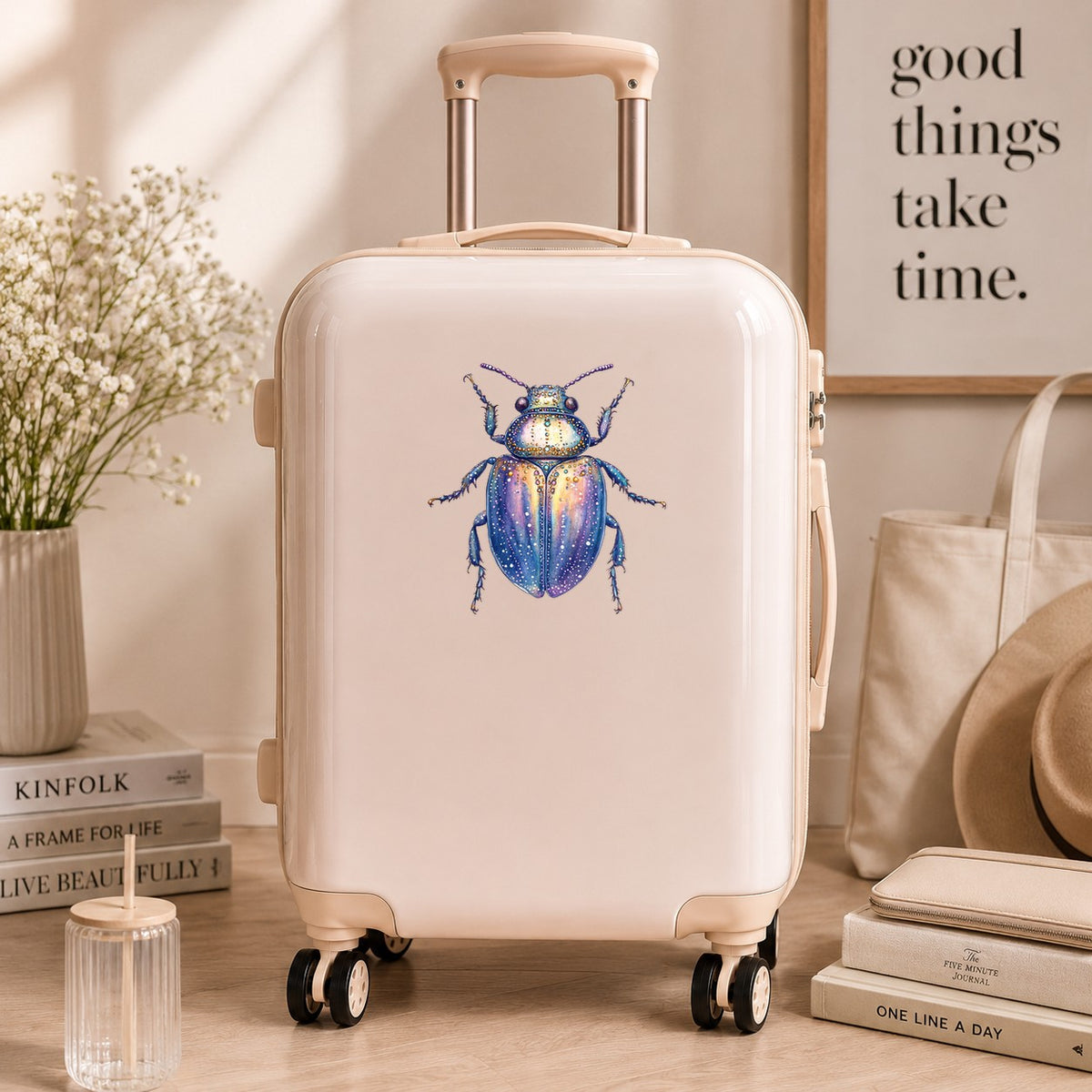 Lavender Jeweled Beetle UV DTF sticker applied to a cream carry-on suitcase