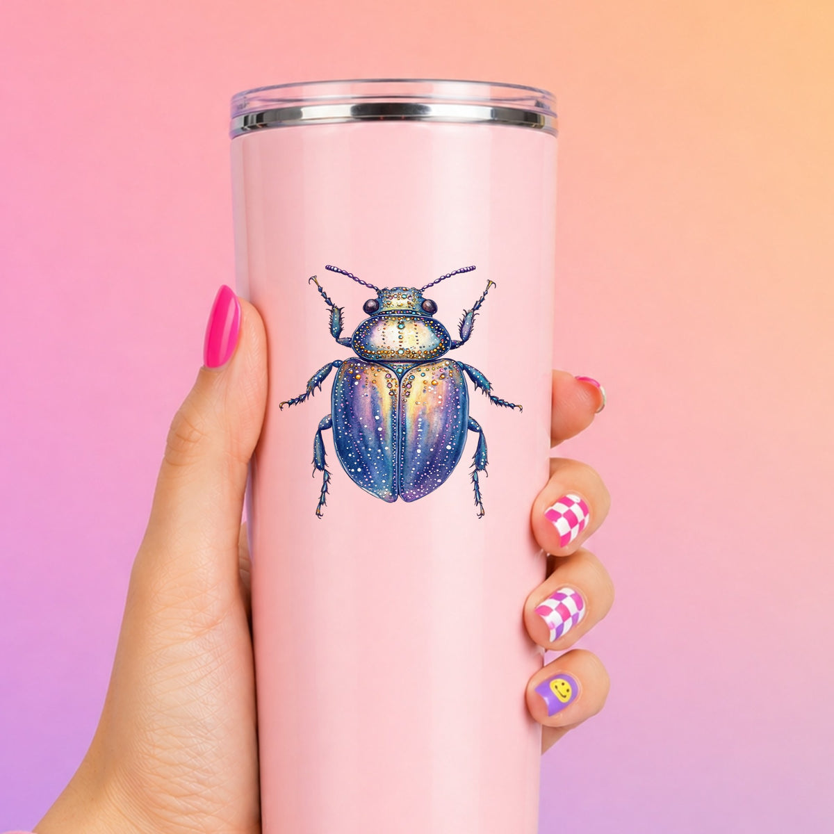 Lavender Jeweled Beetle UV DTF sticker applied to a tall pink tumbler on a pink and orange background
