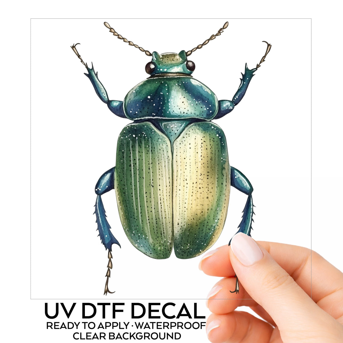 Green Scarab Beetle UV DTF sticker on its backing card, held in hand