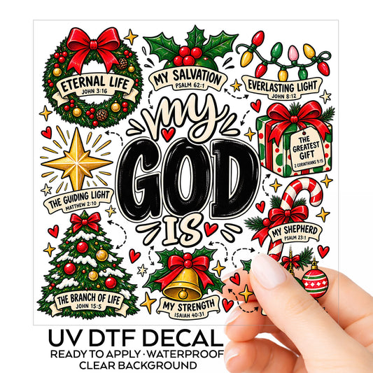 My God Is Christmas Scripture UV DTF sticker on its backing card, held in hand