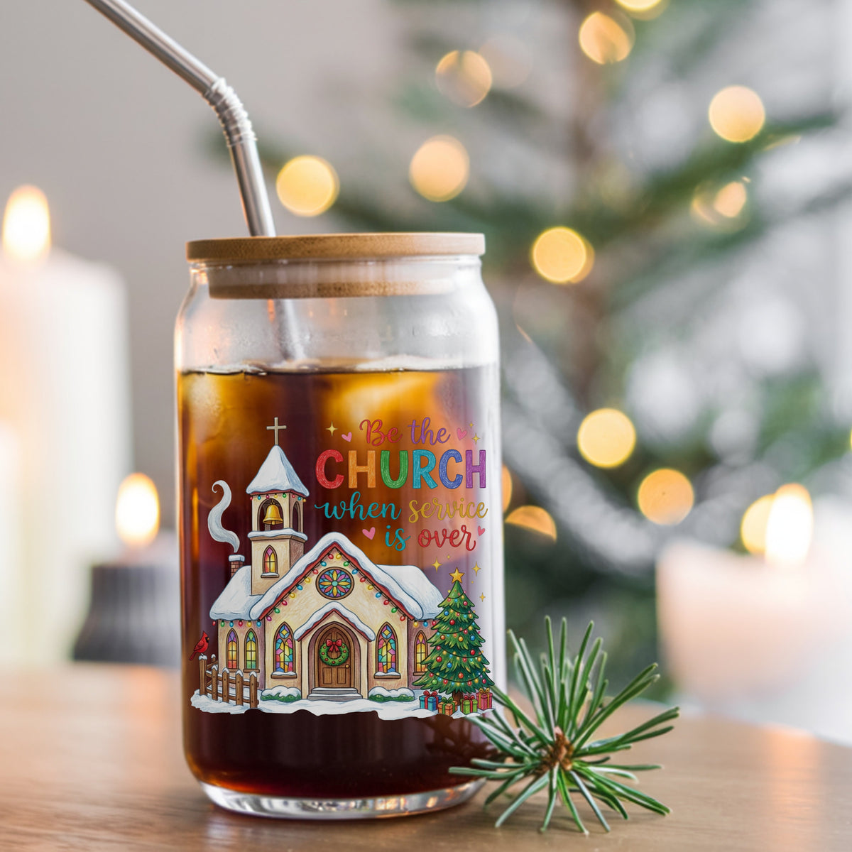 Be The Church Christmas Quote UV DTF sticker applied to a glass can cup of iced coffee with a straw