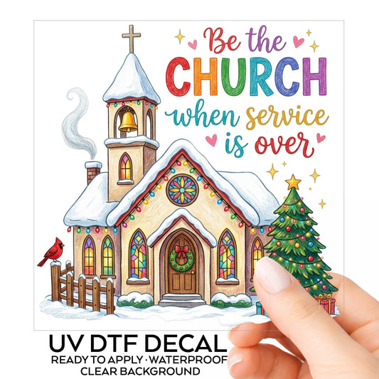 Be The Church Christmas Quote UV DTF sticker on its backing card, held in hand