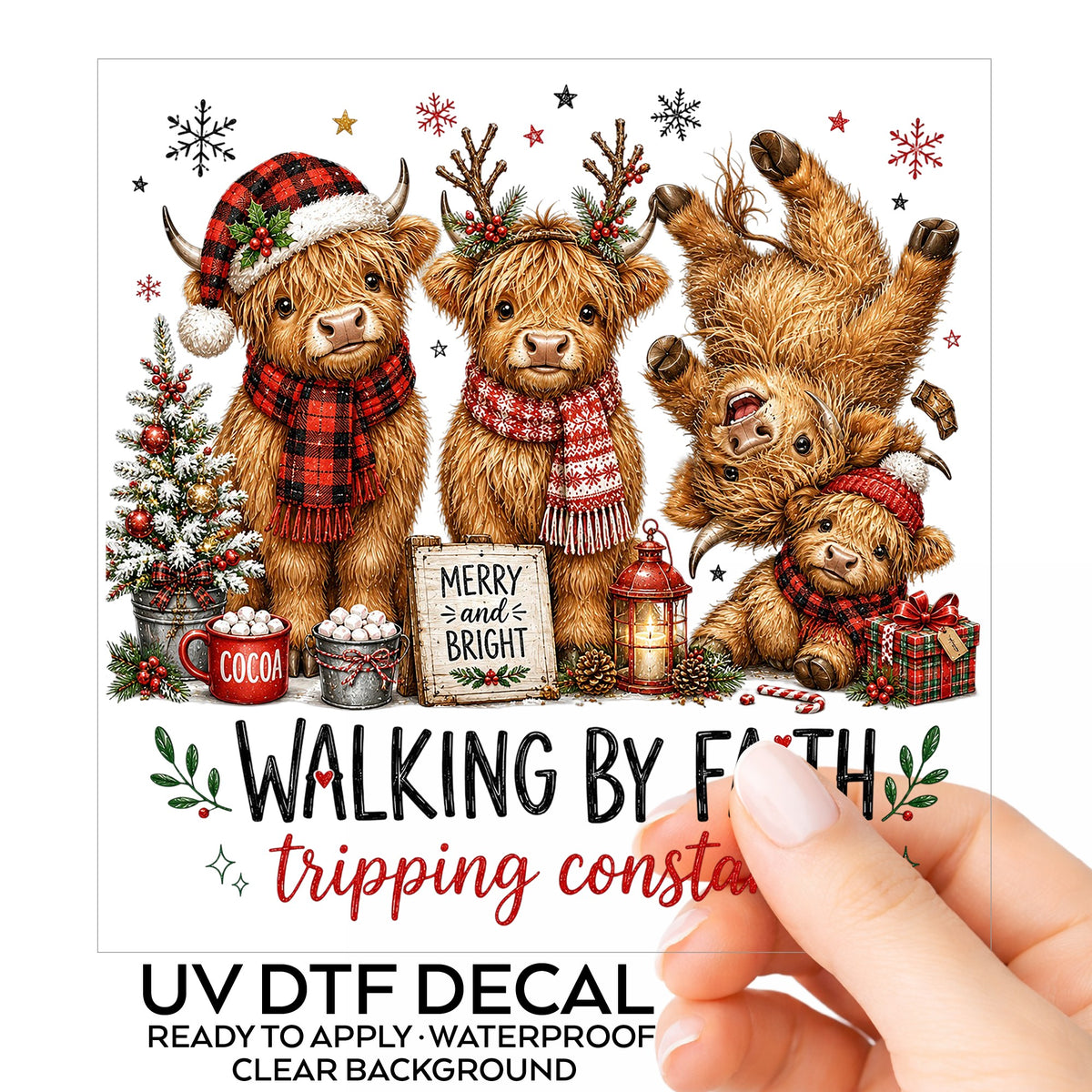 Walking By Faith Christmas Highland Cows UV DTF sticker on its backing card, held in hand