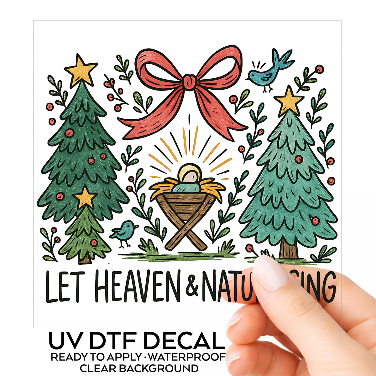 Let Heaven And Nature Sing Nativity UV DTF sticker on its backing card, held in hand