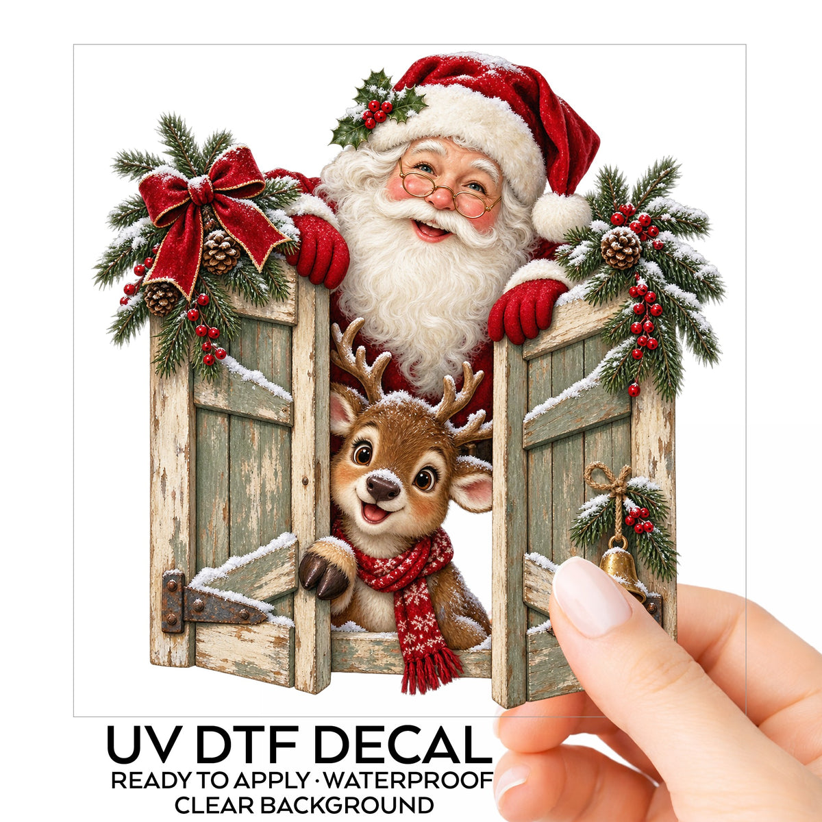 Santa And Reindeer Behind Wooden Shutters UV DTF sticker on its backing card, held in hand