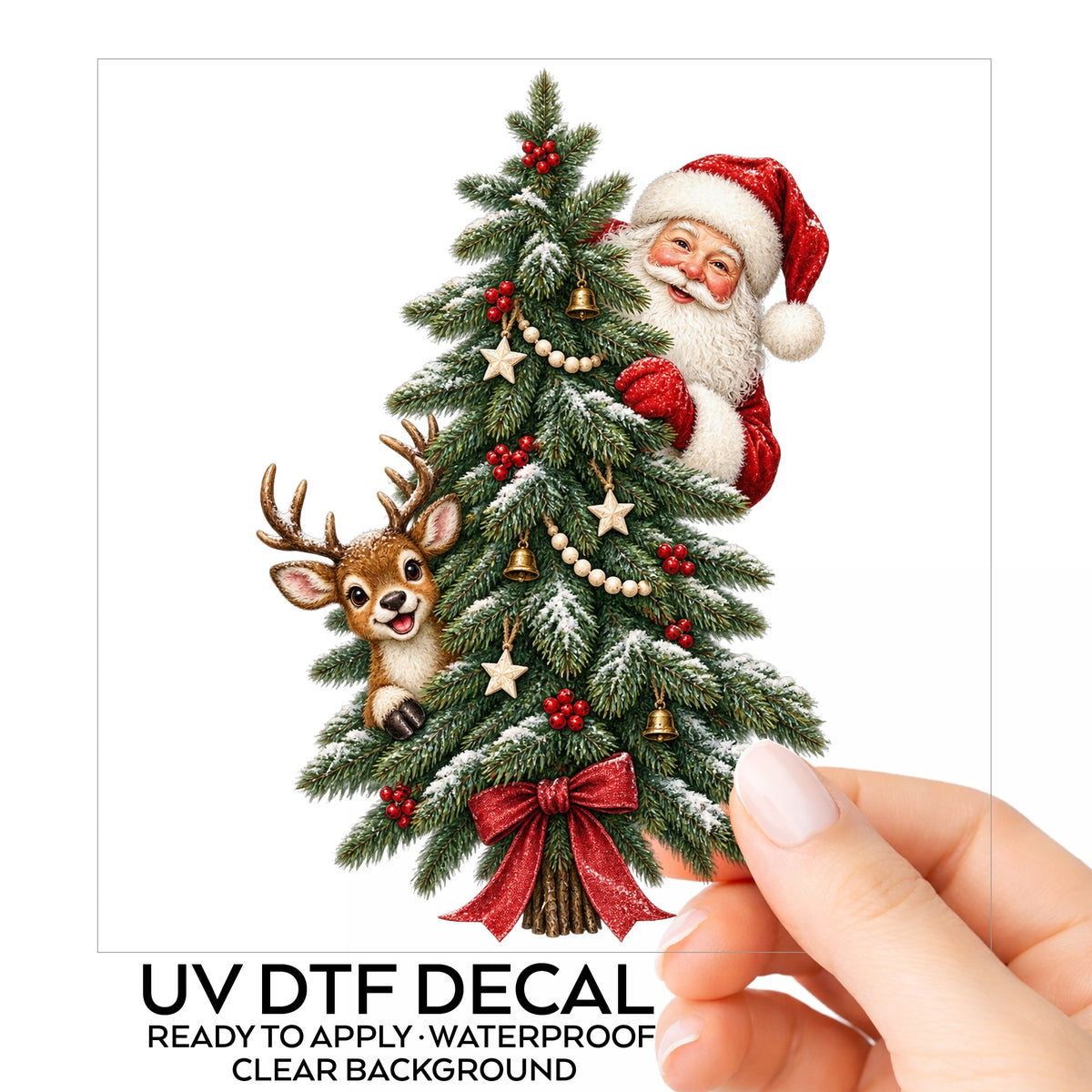 Santa And Reindeer Peeking Behind Christmas Tree UV DTF sticker on its backing card, held in hand