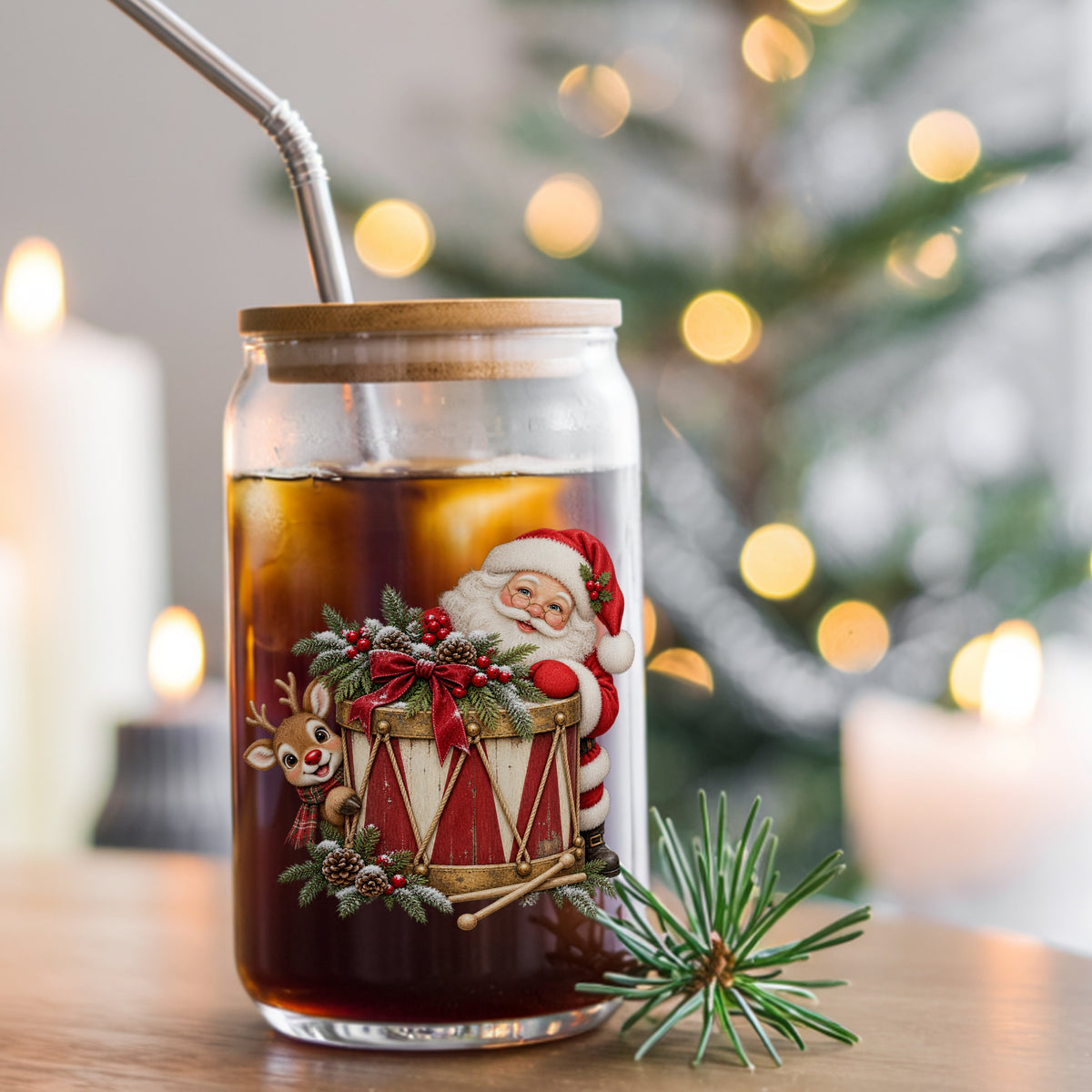 Santa And Reindeer With Vintage Toy Drum UV DTF sticker applied to a glass can cup of iced coffee with a straw