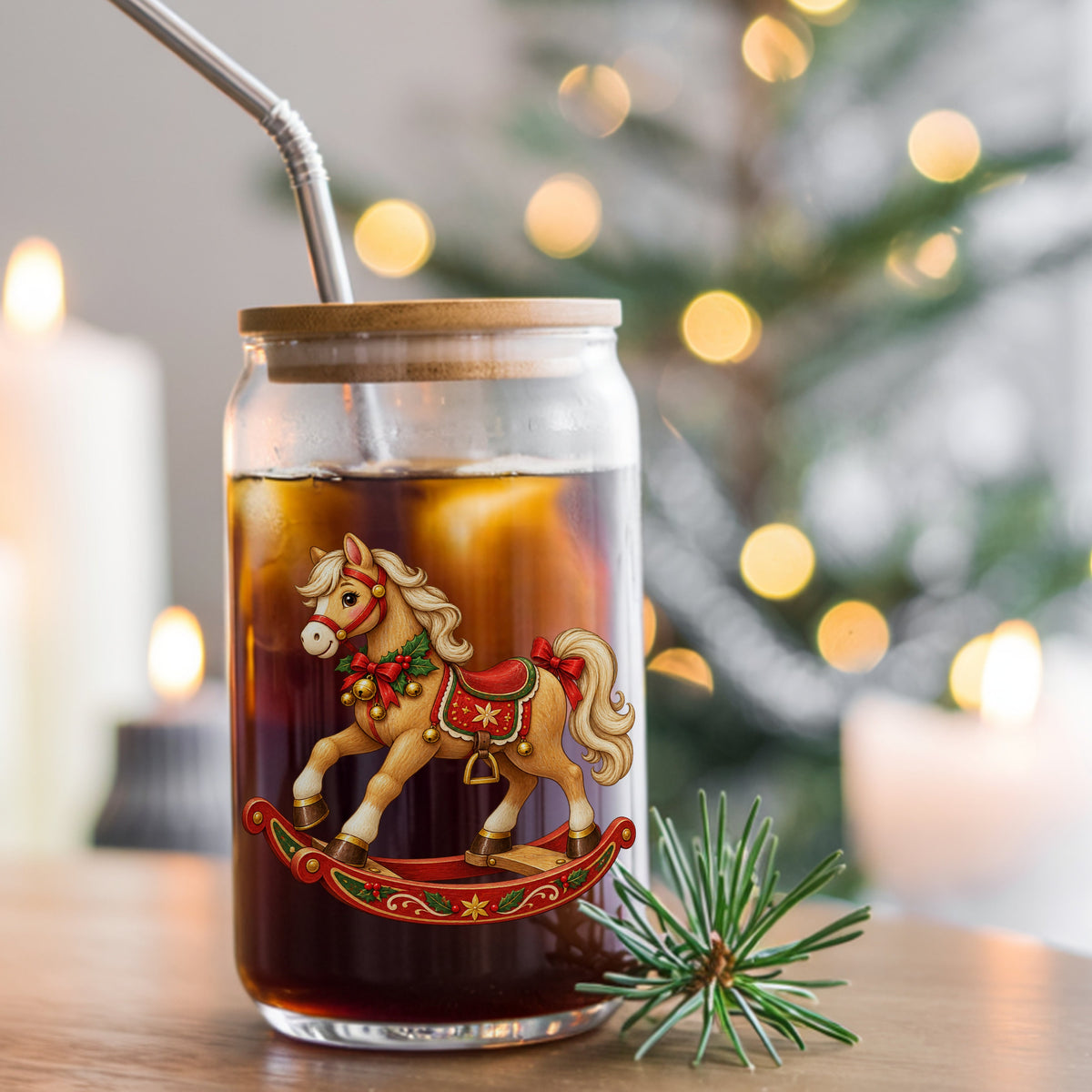 Vintage Christmas Rocking Horse UV DTF sticker applied to a glass can cup of iced coffee with a straw