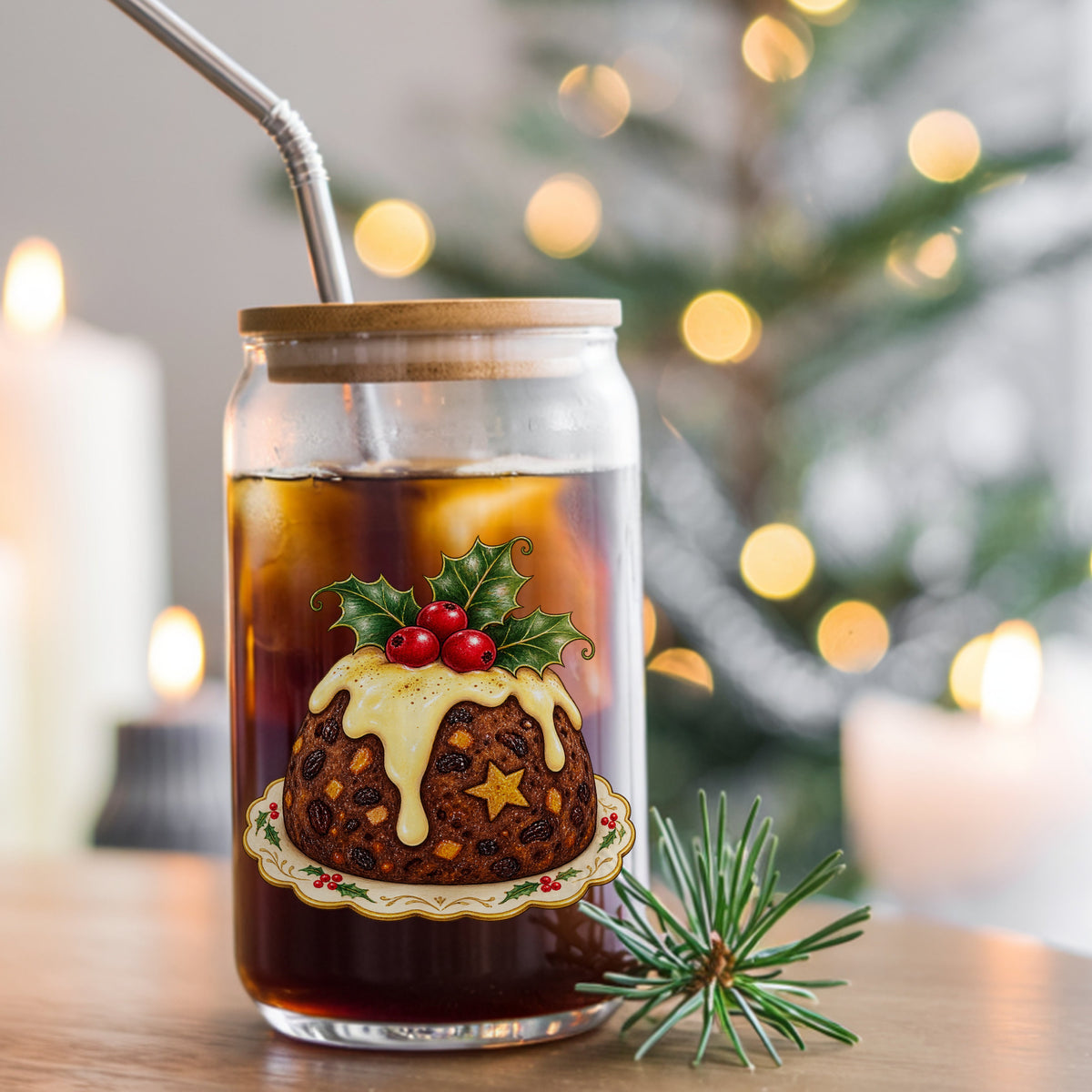 Christmas Pudding With Holly UV DTF sticker applied to a glass can cup of iced coffee with a straw