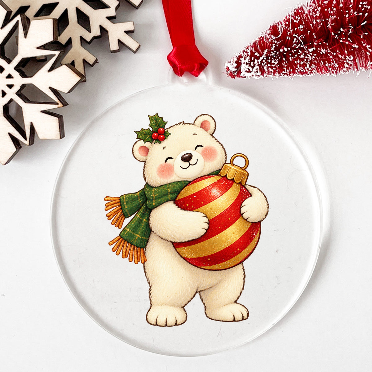 Polar Bear Hugging Christmas Bauble UV DTF sticker applied to a clear round acrylic ornament with a red ribbon