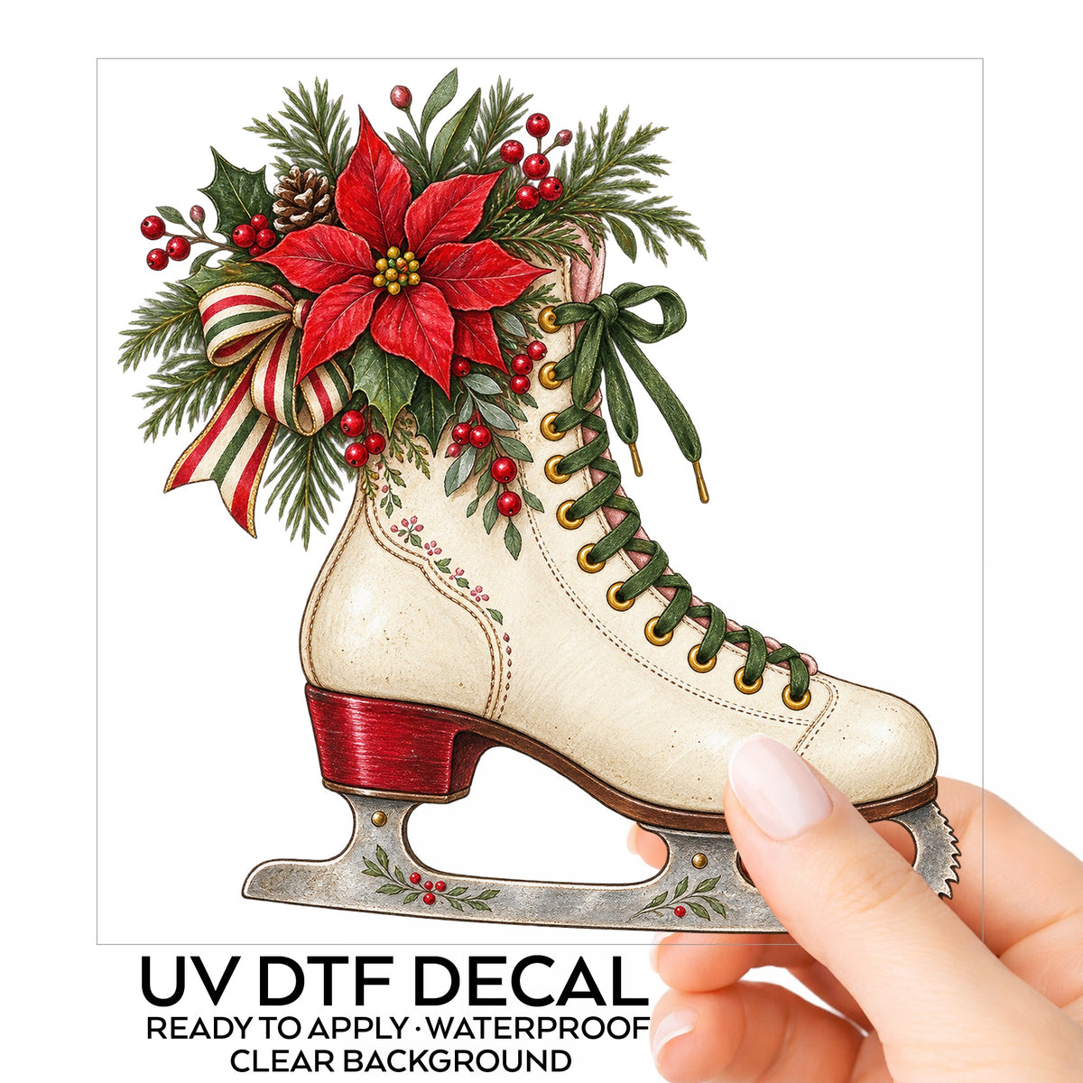 Vintage Ice Skate With Poinsettia UV DTF sticker on its backing card, held in hand
