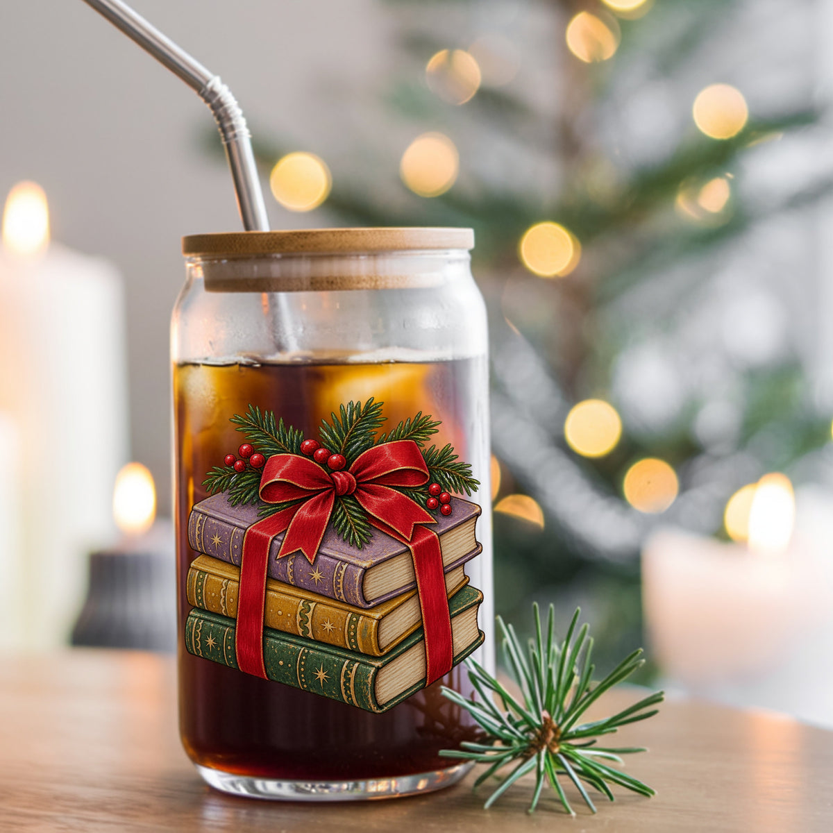 Christmas Book Stack With Red Bow UV DTF sticker applied to a glass can cup of iced coffee with a straw
