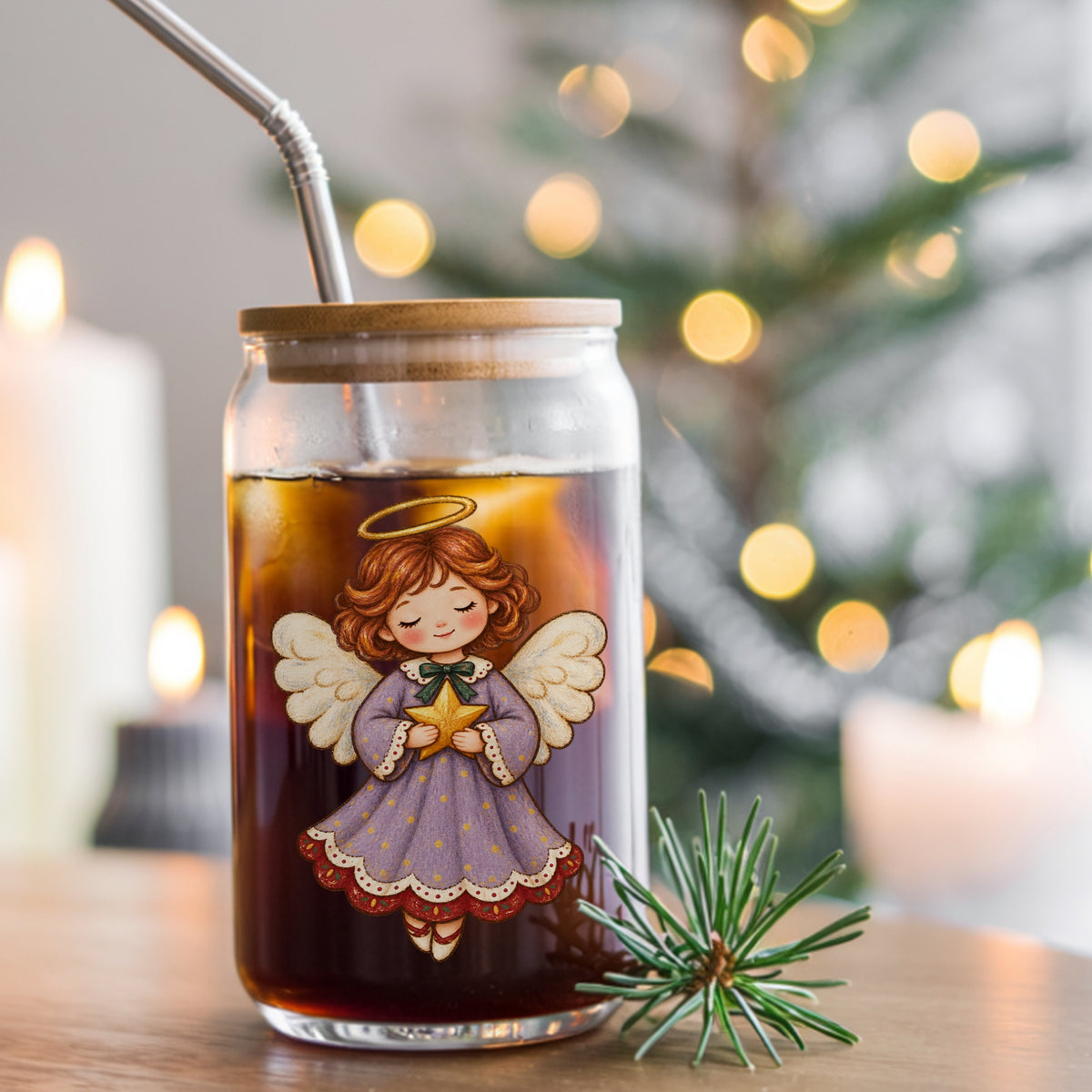 Little Angel Girl Holding Gold Star UV DTF sticker applied to a glass can cup of iced coffee with a straw