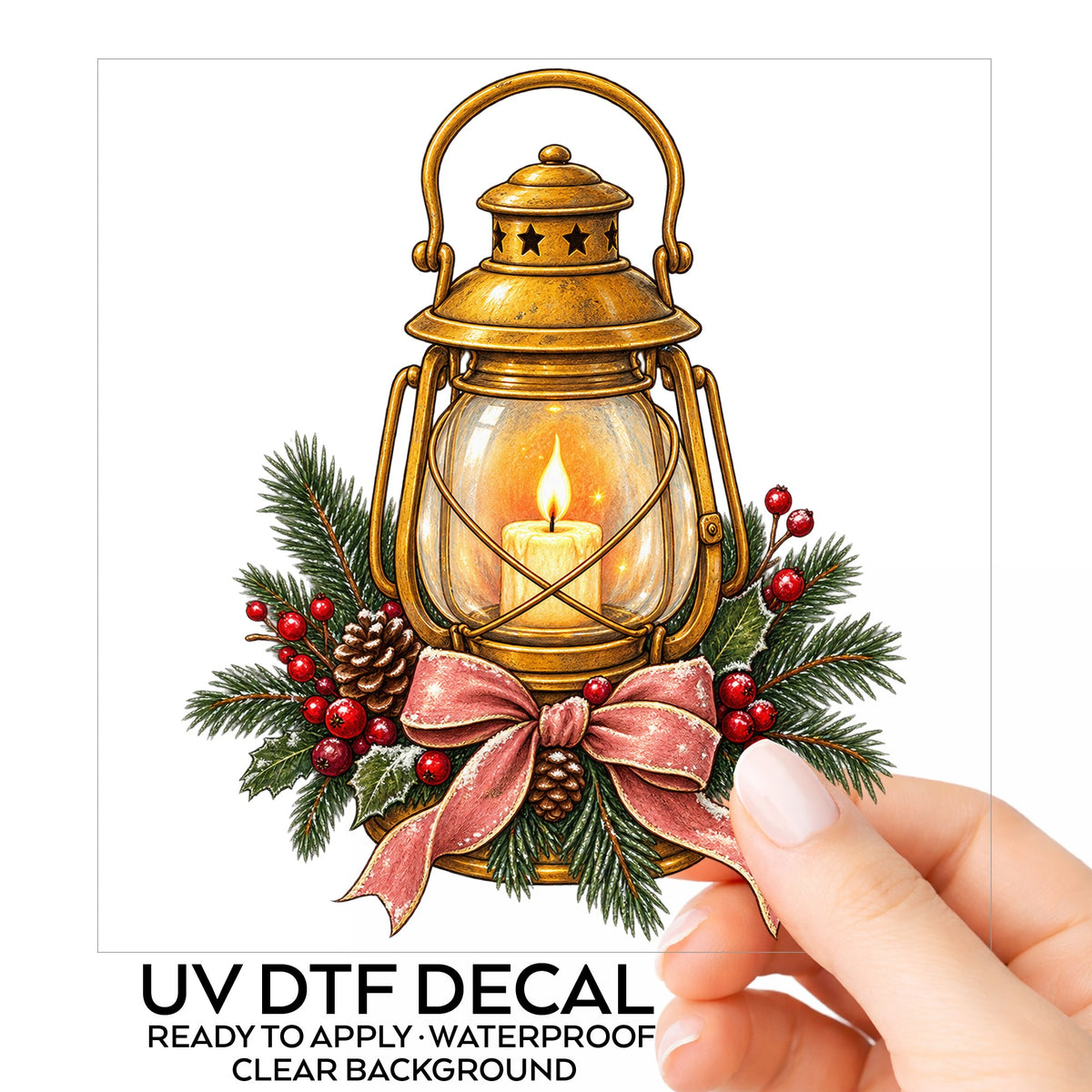 Vintage Brass Lantern With Candle And Pine UV DTF sticker on its backing card, held in hand