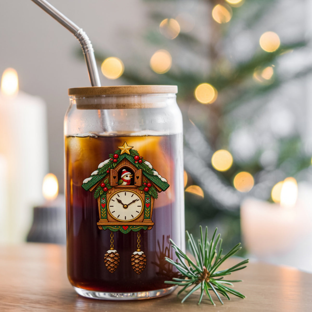 Christmas Cuckoo Clock UV DTF sticker applied to a glass can cup of iced coffee with a straw