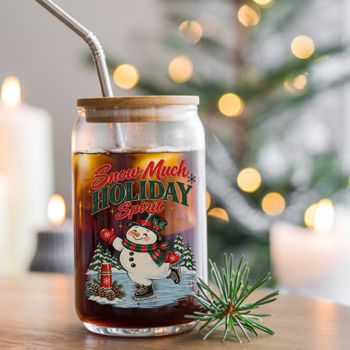 Snow Much Holiday Spirit Snowman UV DTF sticker applied to a glass can cup of iced coffee with a straw