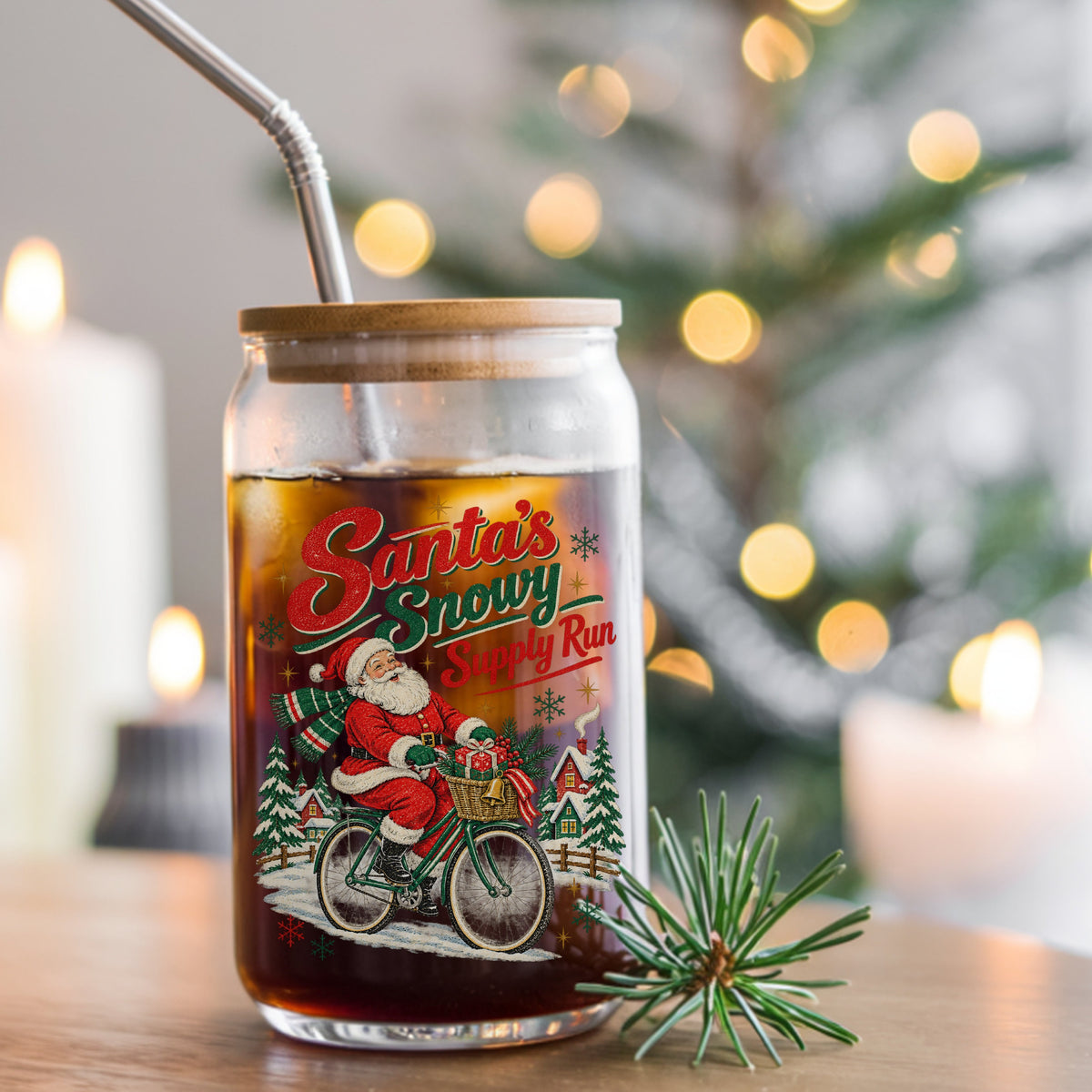 Santa's Snowy Supply Run Bicycle UV DTF sticker applied to a glass can cup of iced coffee with a straw