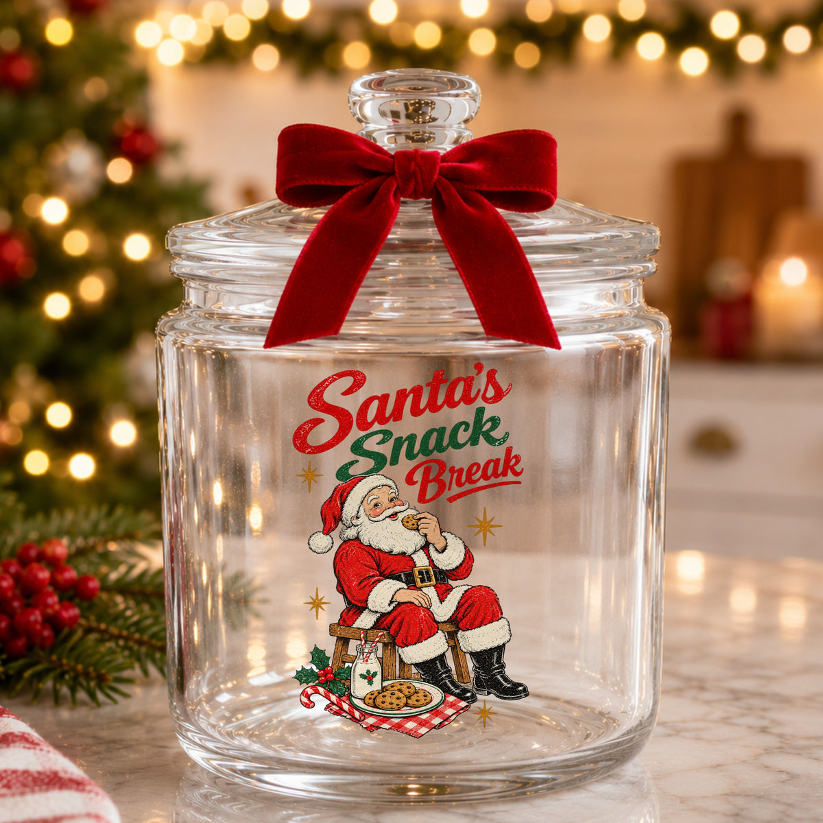 Santa's Snack Break Cookies UV DTF sticker applied to a glass candy jar tied with a red bow