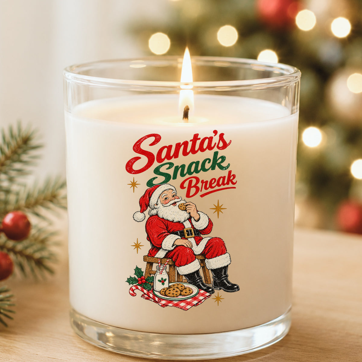 Santa's Snack Break Cookies UV DTF sticker applied to a white candle in a glass holder near Christmas lights