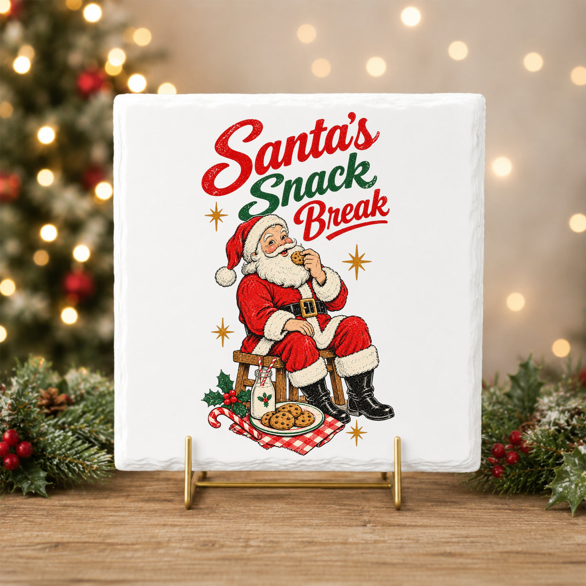 Santa's Snack Break Cookies UV DTF sticker applied to a white tile on a gold stand
